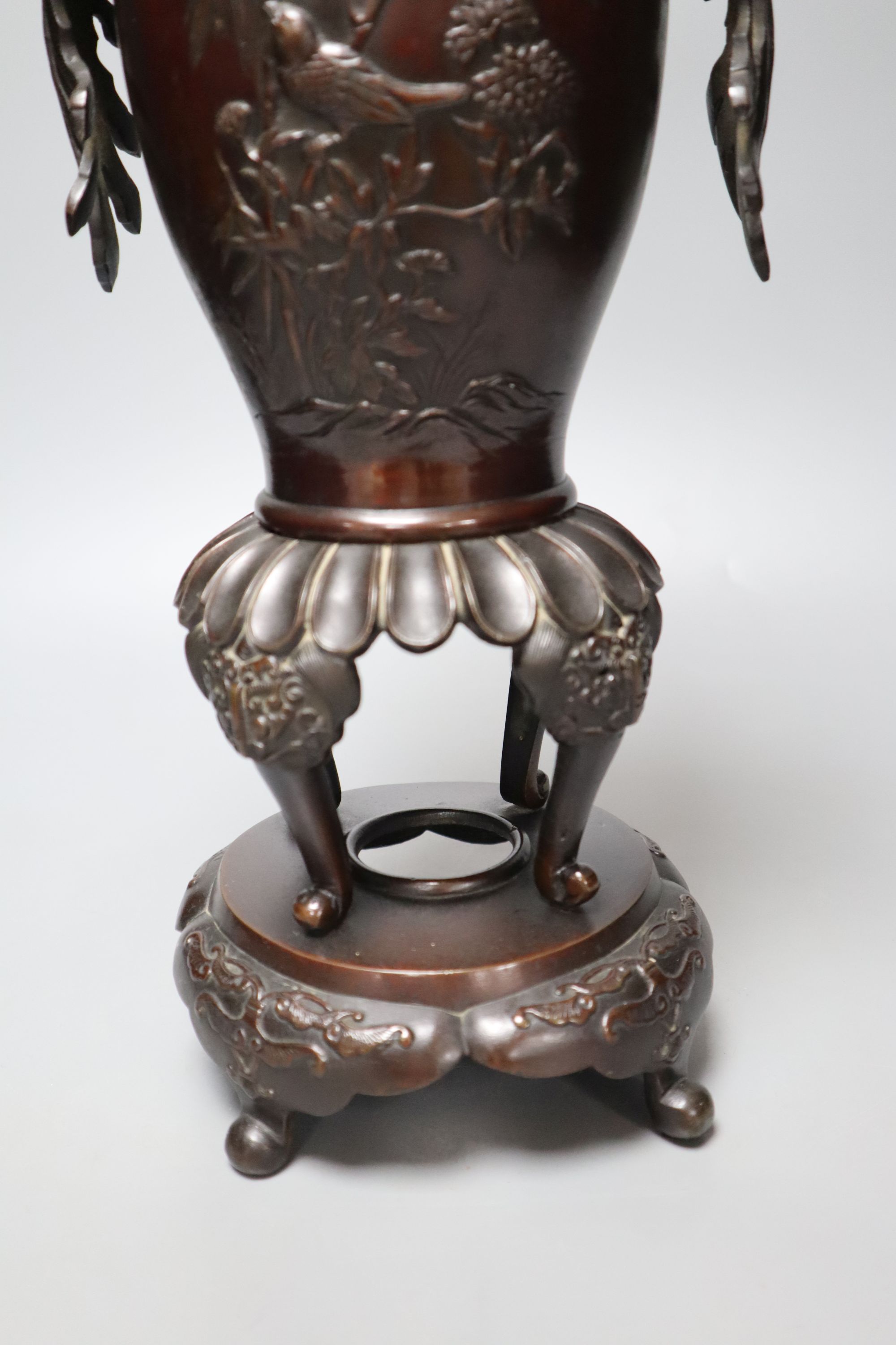 A 19th century Japanese Meiji period bronze censer vase, the handles formed as phoenix, height 41cm
